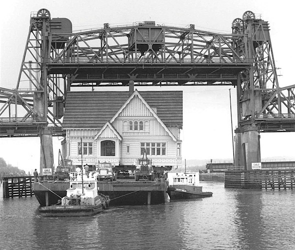 The Weyerhaeuser Building was barged down the Snohomish River from Mill B to the Marina Village in 1983. The Weyerhaeuser Building was barged down the Snohomish River from Mill B to the Marina Village in 1983.